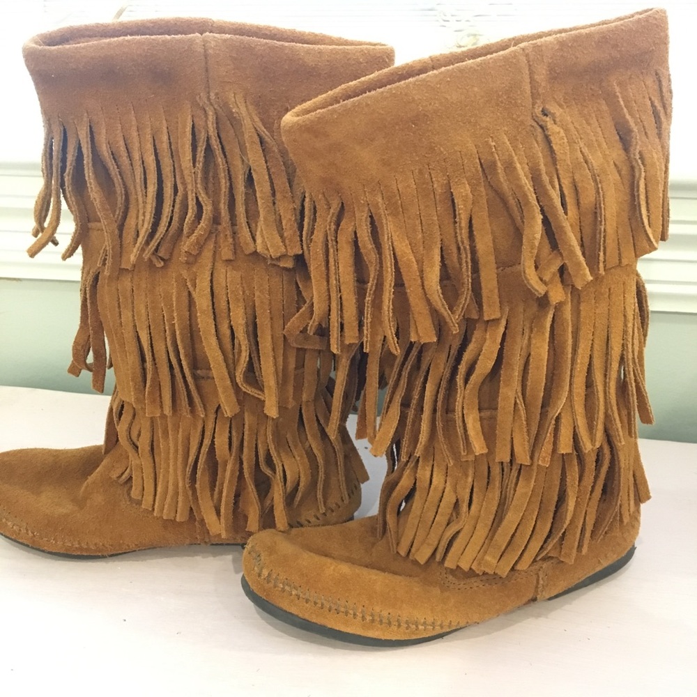 Minnetonka three layer fringe boots.